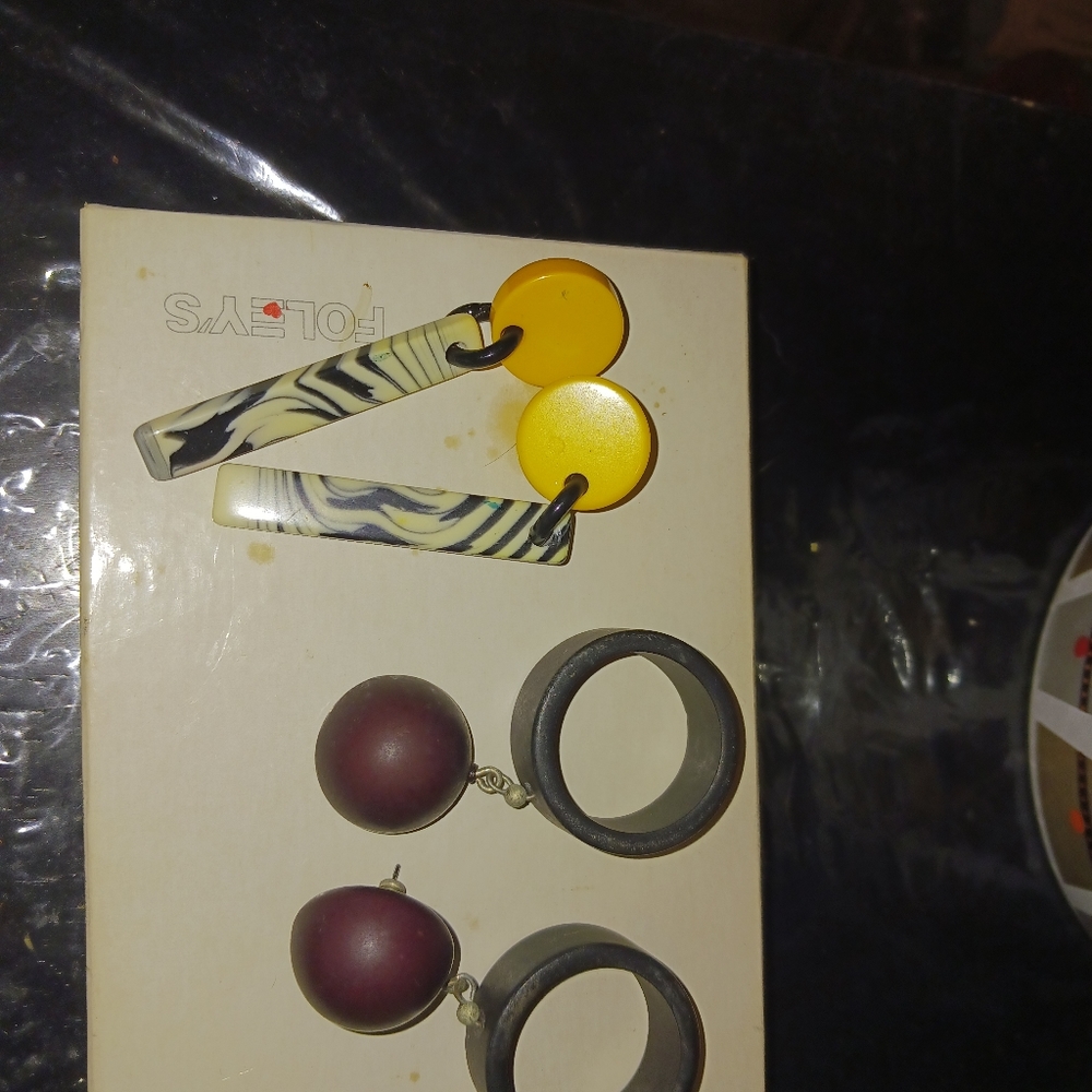 2 pair of earrings zebra and wooden earrings.